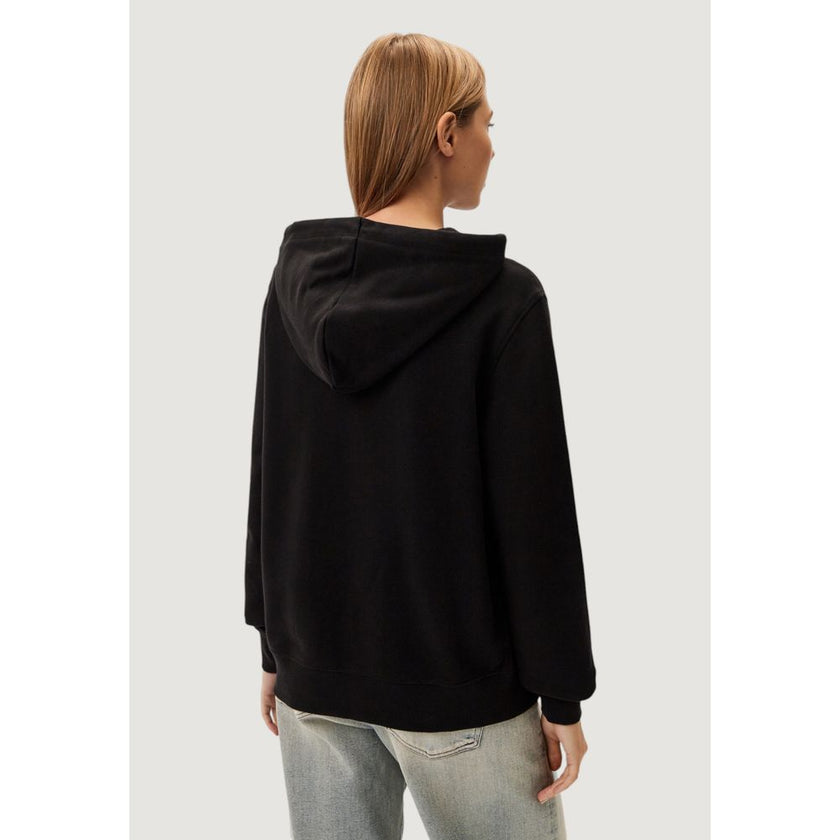 Black Recycled Cotton SweatshirtDiscover the Calvin Klein Jeans EMBROIDERED CK REGUL J20J224179 women’s sweatshirt, crafted from 100% recycled cotton. This garment combines comfort and style, making it perfect for a casual and fashionable look. The sweats
