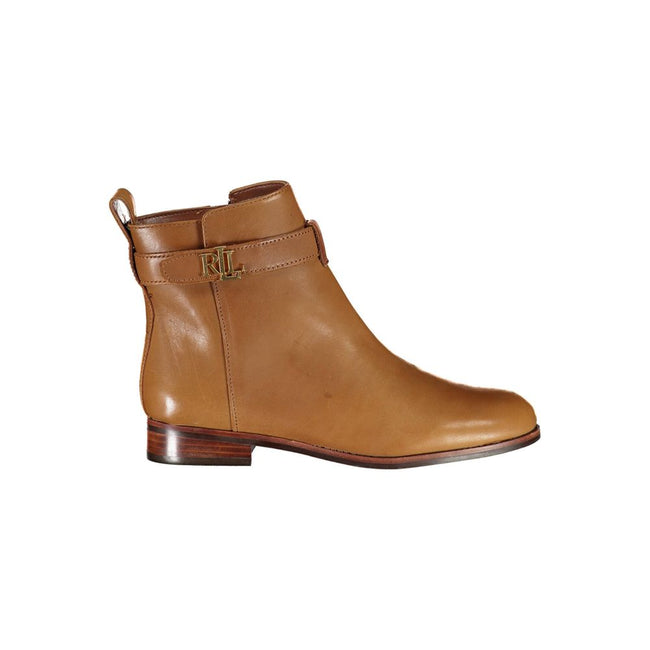 Brown Leather Women BootUnleash your inner fashionista with these Ralph Lauren ankle boots that effortlessly blend chic with edge. Adorned with contrasting details that pop and a side zip for ease, these boots manifest sophistication. Crafted with the fin