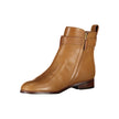 Brown Leather Women BootUnleash your inner fashionista with these Ralph Lauren ankle boots that effortlessly blend chic with edge. Adorned with contrasting details that pop and a side zip for ease, these boots manifest sophistication. Crafted with the fin