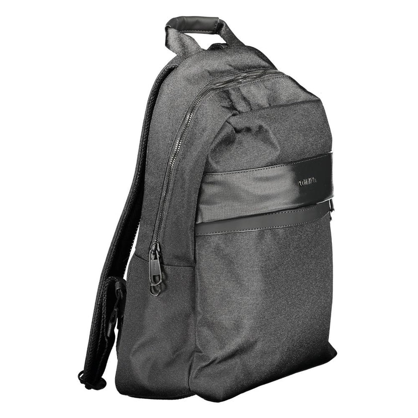 Black Polyester Backpackbackpack 1 handle, adjustable straps, 1 external pocket, contrasting details, zip closure, logo, 100% recycled polyesterBlack Polyester Backpack${tagsCalvin KleinAulae Black Polyester Backpack Calvin KleinAulae Black Polyester Back