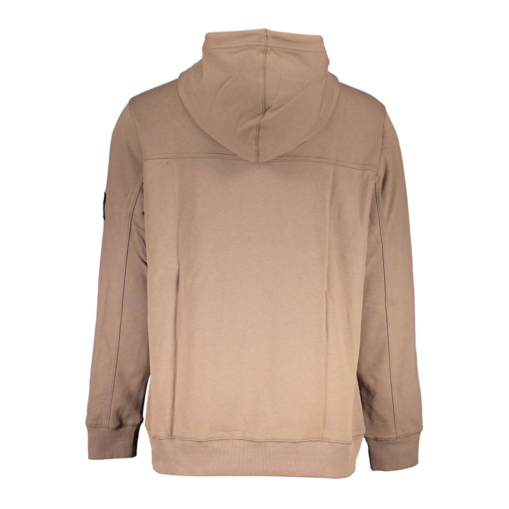 Brown Cotton Men SweaterIndulge in the epitome of contemporary sophistication with Calvin Klein’s sleek brown hoodie. This long-sleeved marvel uniquely combines comfort with style, featuring a central pocket for utility and an iconic logo that commands at