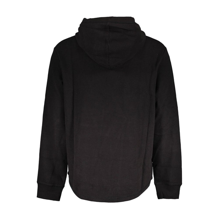 Black Cotton Men SweaterIndulge in the epitome of sleek style with this Calvin Klein long-sleeved hooded sweatshirt. Adorned with bold embroidery and the iconic logo print, it’s a manifestation of modern luxury. Crafted from a sumptuous blend of cotton an