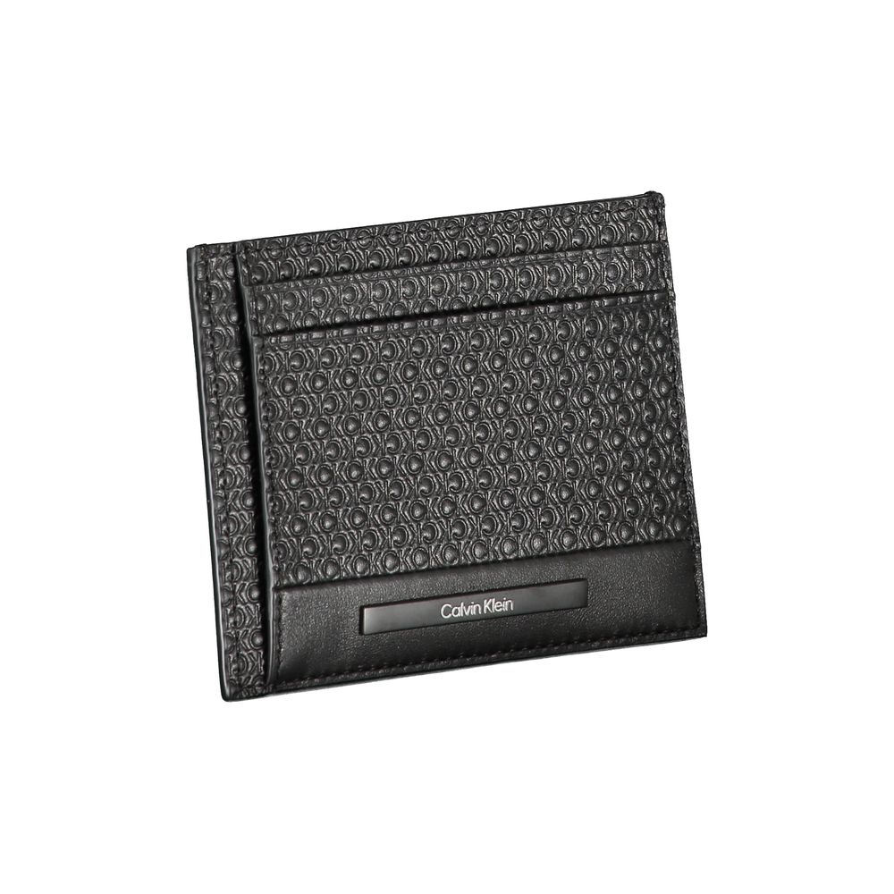 Black Leather WalletCARD HOLDER, 2 SIDE COMPARTMENTS, 1 CENTRAL POCKET, CONTRASTING DETAILS, LOGOBlack Leather Wallet${tagsCalvin KleinAulae Black Leather Wallet Calvin KleinAulae Black Leather Wallet CARD HOLDER, 2 SIDE COMPARTMENTS, 1 CENTRAL POCKET, CO