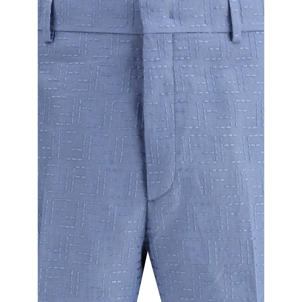 Light Blue Linen Bermuda ShortsFendi’s signature linen jacquard Shorts feature the iconic FF all-over pattern. They feature belt loops, side pockets and buttoned welt back pockets. Covered front zipper closure and small side slits at the bottom. A refined