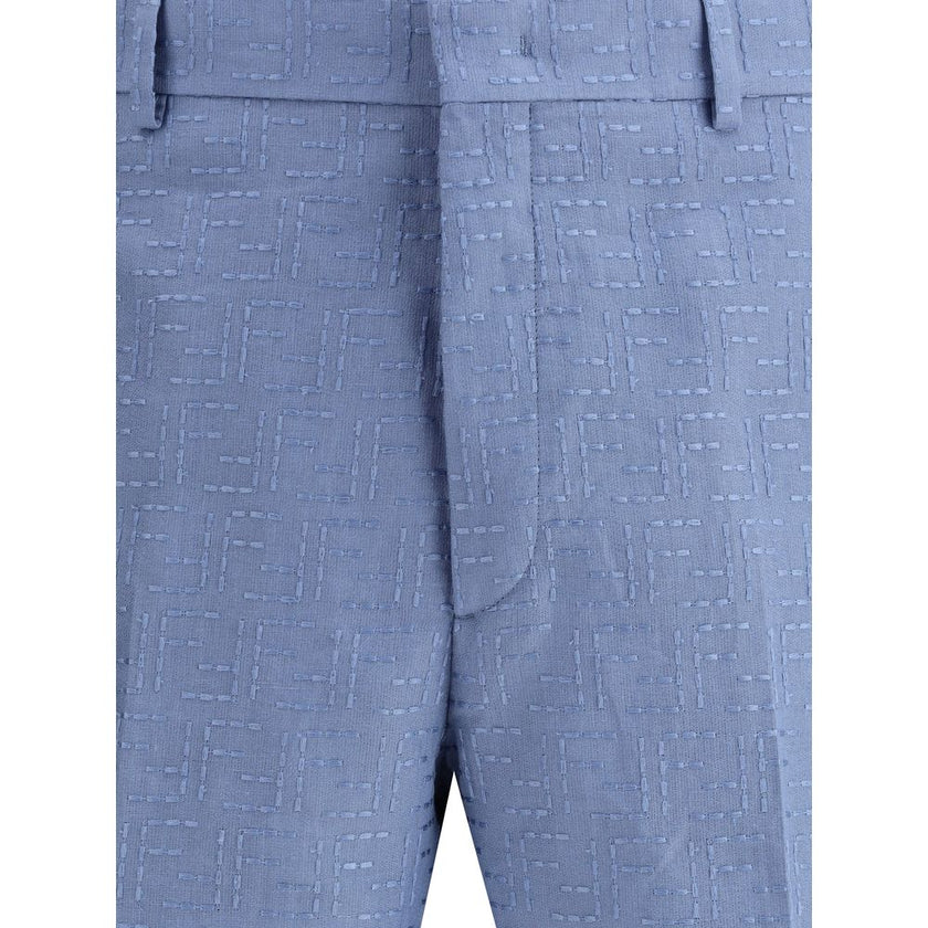 Light Blue Linen Bermuda ShortsFendi’s signature linen jacquard Shorts feature the iconic FF all-over pattern. They feature belt loops, side pockets and buttoned welt back pockets. Covered front zipper closure and small side slits at the bottom. A refined