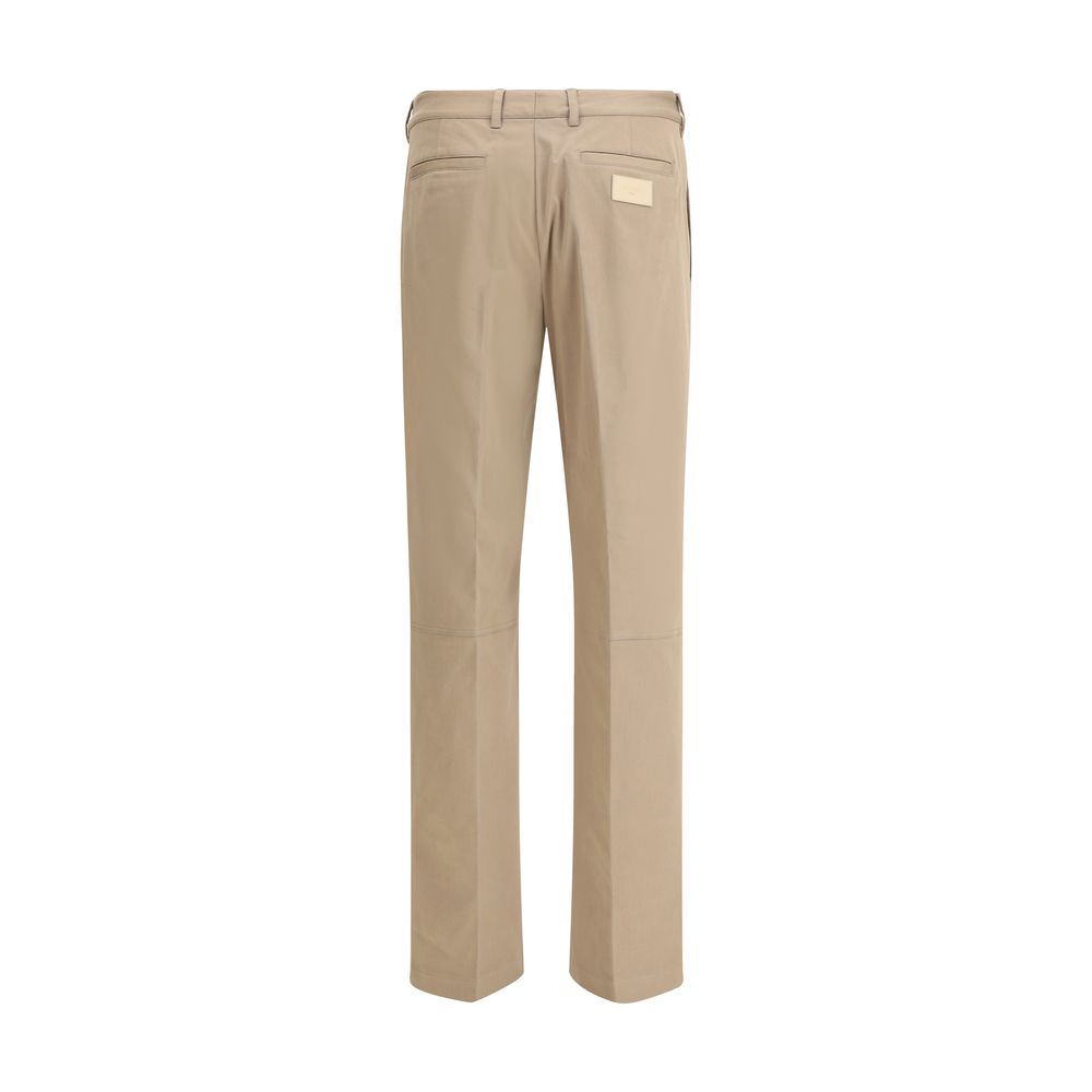 Brown Cotton Casual PantsFendi’s cotton New Rich Pants combine clean lines and distinctive details for a contemporary, refined look. Made of high-quality cotton, they feature a front zipper and button closure, belt loops at the waist, and a functional des