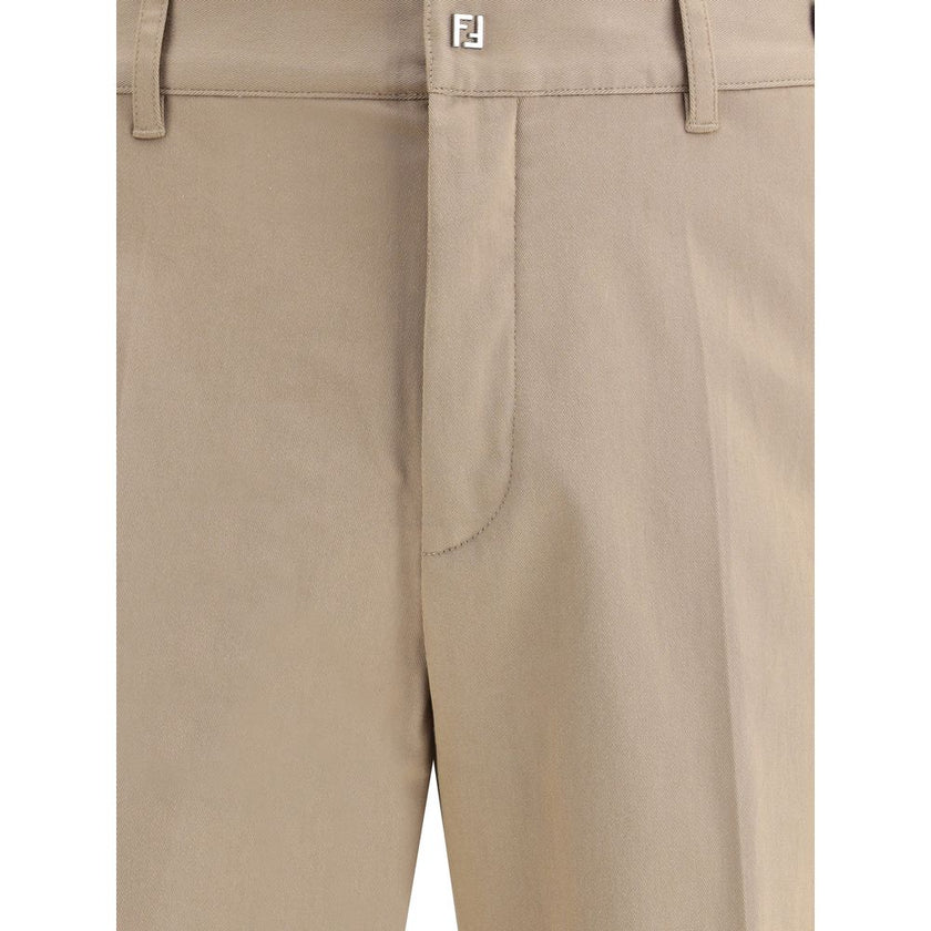 Brown Cotton Casual PantsFendi’s cotton New Rich Pants combine clean lines and distinctive details for a contemporary, refined look. Made of high-quality cotton, they feature a front zipper and button closure, belt loops at the waist, and a functional des