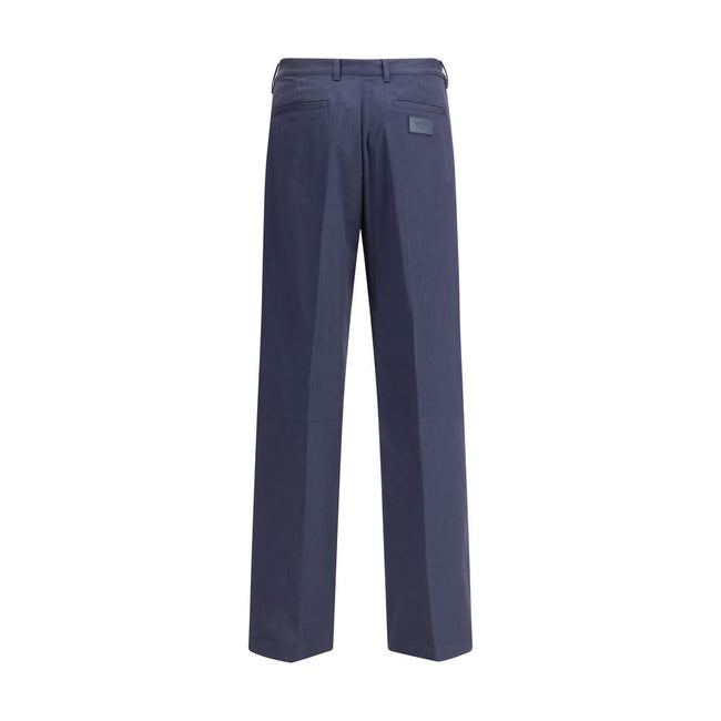 Blue Cotton Casual PantsFendi’s cotton New Rich Pants combine clean lines and distinctive details for a contemporary, refined look. Made of high-quality cotton, they feature a front zipper and button closure, belt loops at the waist, and a functional desi