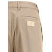Brown Cotton Casual PantsFendi’s cotton New Rich Pants combine clean lines and distinctive details for a contemporary, refined look. Made of high-quality cotton, they feature a front zipper and button closure, belt loops at the waist, and a functional des