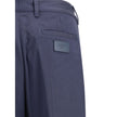 Blue Cotton Casual PantsFendi’s cotton New Rich Pants combine clean lines and distinctive details for a contemporary, refined look. Made of high-quality cotton, they feature a front zipper and button closure, belt loops at the waist, and a functional desi