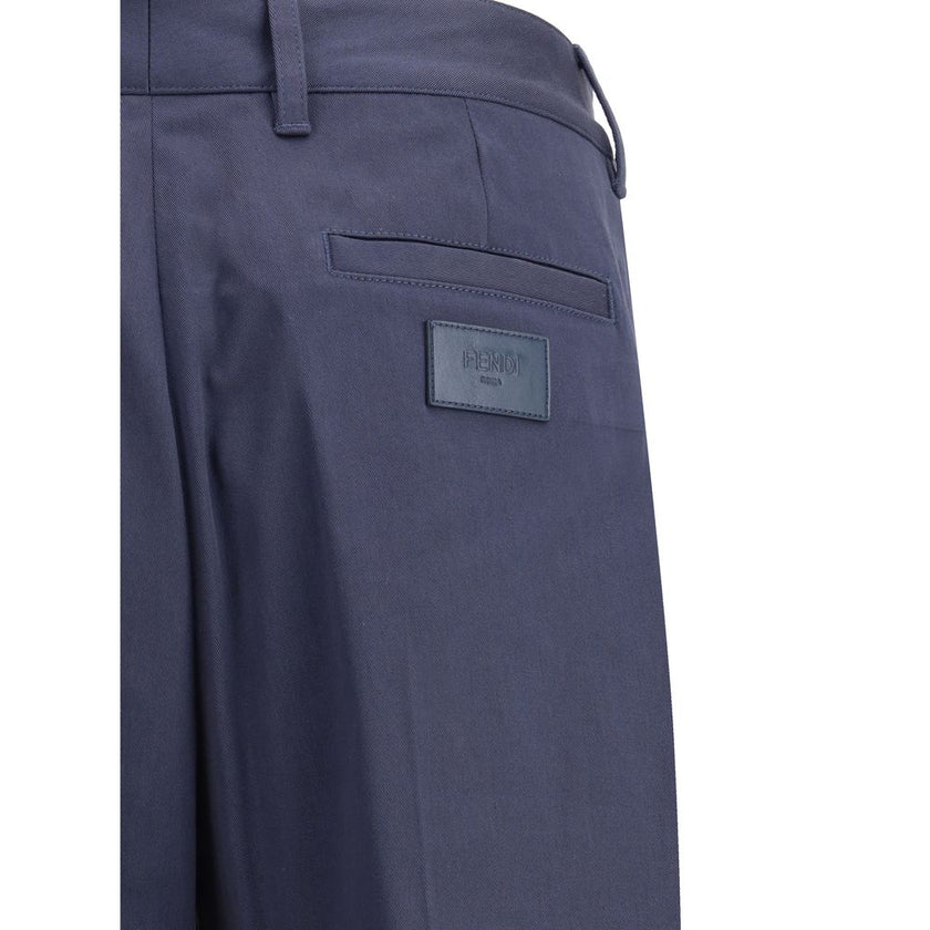 Blue Cotton Casual PantsFendi’s cotton New Rich Pants combine clean lines and distinctive details for a contemporary, refined look. Made of high-quality cotton, they feature a front zipper and button closure, belt loops at the waist, and a functional desi