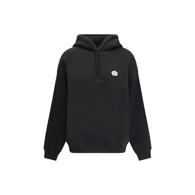 Black Cotton SweatshirtKenzo’s cotton Hoodie combines comfort and iconic style in a relaxed, contemporary design. Made of soft cotton that is internally plush, it features an adjustable drawstring hood and ribbed cuffs and hem for a structured finish. The