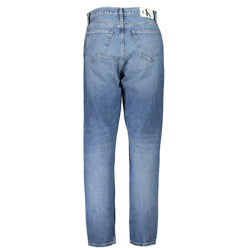 Blue Cotton Women JeanElevate your denim repertoire with the iconic Calvin Klein Mom Jeans. Tailored for a trendsetting fit, these jeans feature a tastefully washed effect that exudes vintage charm. With a classic five-pocket design, they come complete wi