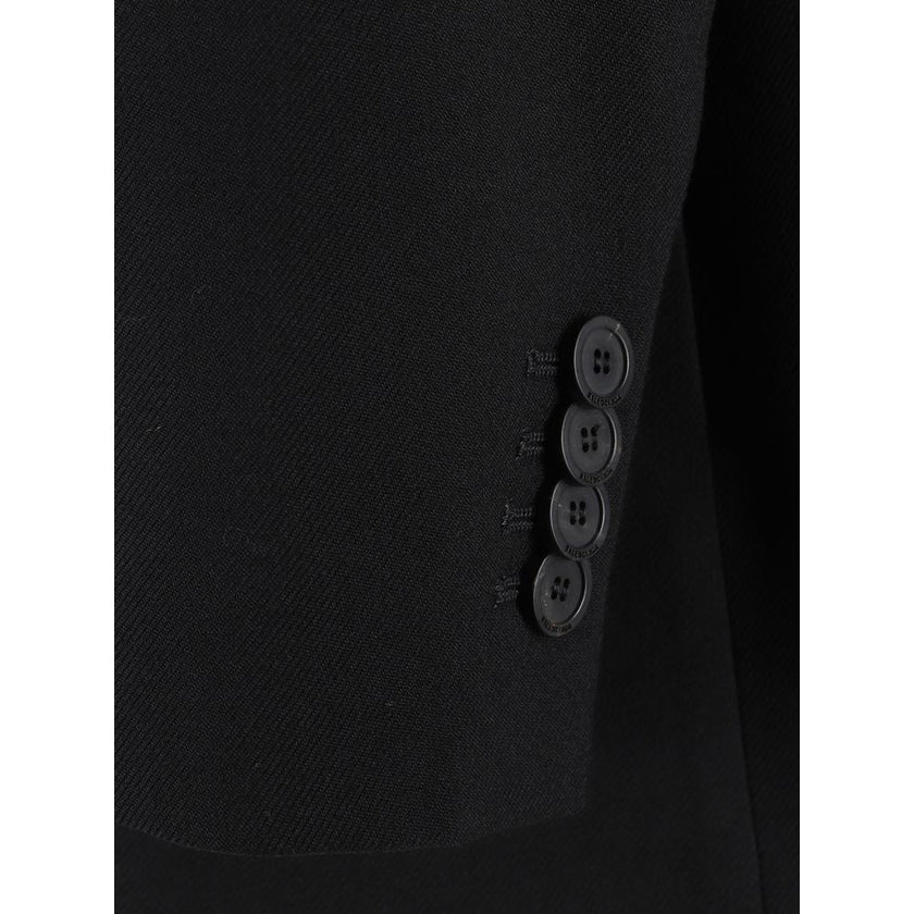 Black Wool BlazerWool Blazer Jacket by Balenciaga featuring front button closure, classic lapels, two side flap welt pockets, one front welt pocket, structured shoulders, regular fit. Season: AW25 Composition: 100% Wool MADE IN ITALYBlack Wool Blazer${tag