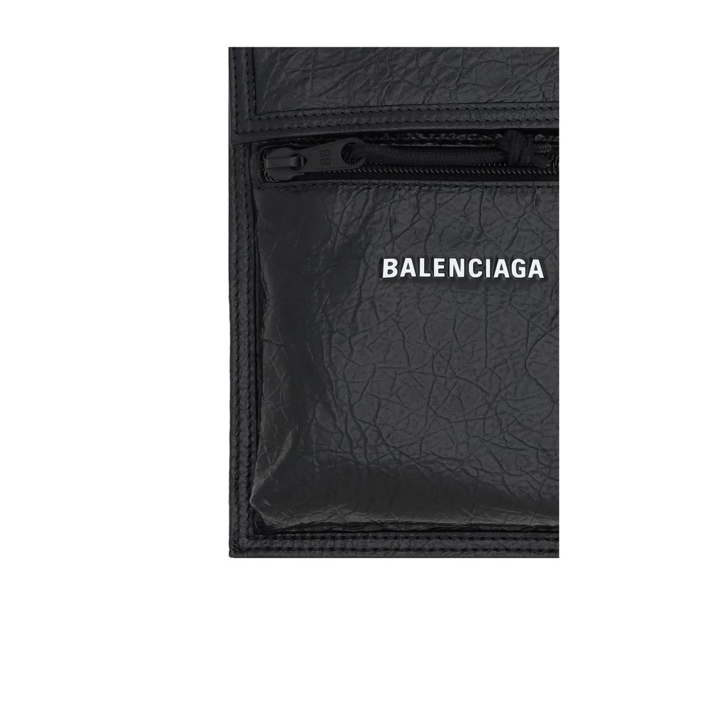 Black Calf Leather Bos Taurus Shoulder BagBalenciaga’s Explorer Shoulder Bag is a modern and versatile accessory made of grained leather that gives a sleek and durable texture. The front flap closure ensures security and practicality, while the front zipp
