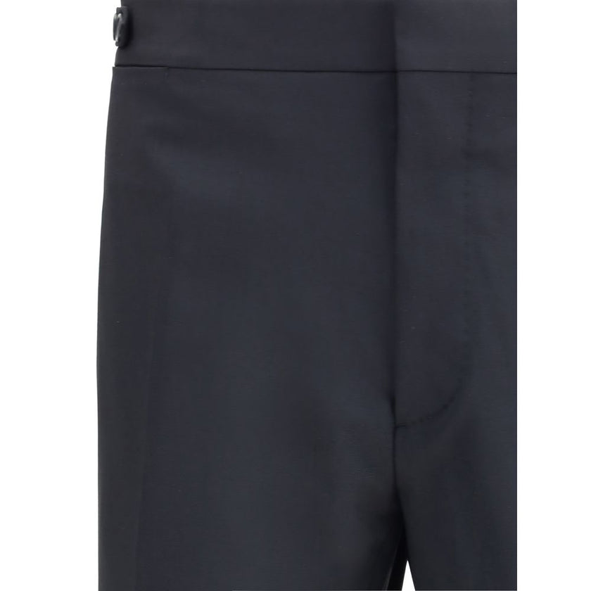 Black Fleece Wool Two-Piece SuitDsquared2 Virgin Wool London Suit, consisting of jacket and pants. Wool blazer jacket, front button closure, three welt pockets on the front with flap, one slit pocket on the front, peaked lapels. Classic wool pants, front