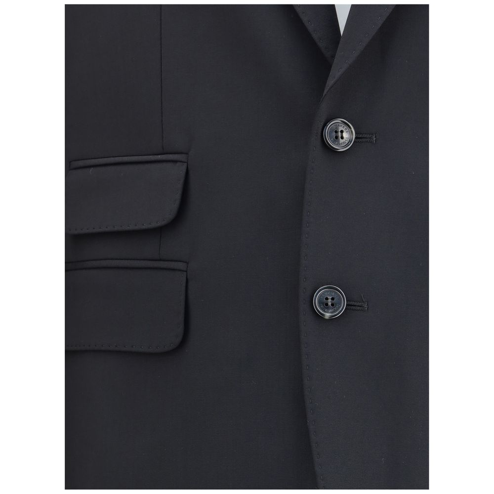 Black Fleece Wool Two-Piece SuitDsquared2 Virgin Wool London Suit, consisting of jacket and pants. Wool blazer jacket, front button closure, three welt pockets on the front with flap, one slit pocket on the front, peaked lapels. Classic wool pants, front