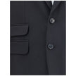 Black Fleece Wool Two-Piece SuitDsquared2 Virgin Wool London Suit, consisting of jacket and pants. Wool blazer jacket, front button closure, three welt pockets on the front with flap, one slit pocket on the front, peaked lapels. Classic wool pants, front
