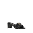 Black Lamb Ovis Aries Aries Stiletto Heel SandalsMiu Miu’s lambskin Sandals combine elegance and comfort in a sophisticated design. With a squared toe and padded straps, they are embellished with a metal plaque featuring the iconic Miu Miu monogram on the