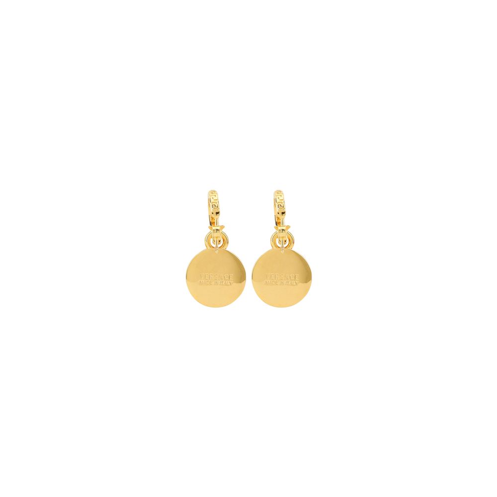 Gold Brass EarringsVersace Earrings feature a timeless round design, embellished with the iconic Medusa head in relief on the front. A distinctive symbol of the House, they add a bold and recognizable touch to any look, blending classic elegance and stron