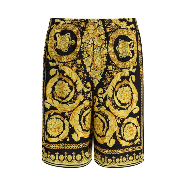 Multicolor Silk Bermuda ShortsSilk Shorts by Versace featuring the brand’s iconic baroque pattern. The model features an elasticized waistband for a comfortable and flexible fit, two side slash pockets and a welt pocket on the back. A lightweight and refi