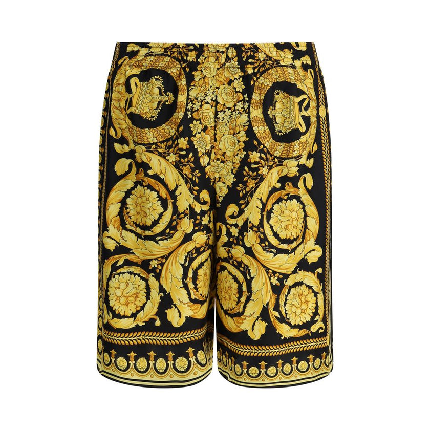 Multicolor Silk Bermuda ShortsSilk Shorts by Versace featuring the brand’s iconic baroque pattern. The model features an elasticized waistband for a comfortable and flexible fit, two side slash pockets and a welt pocket on the back. A lightweight and refi