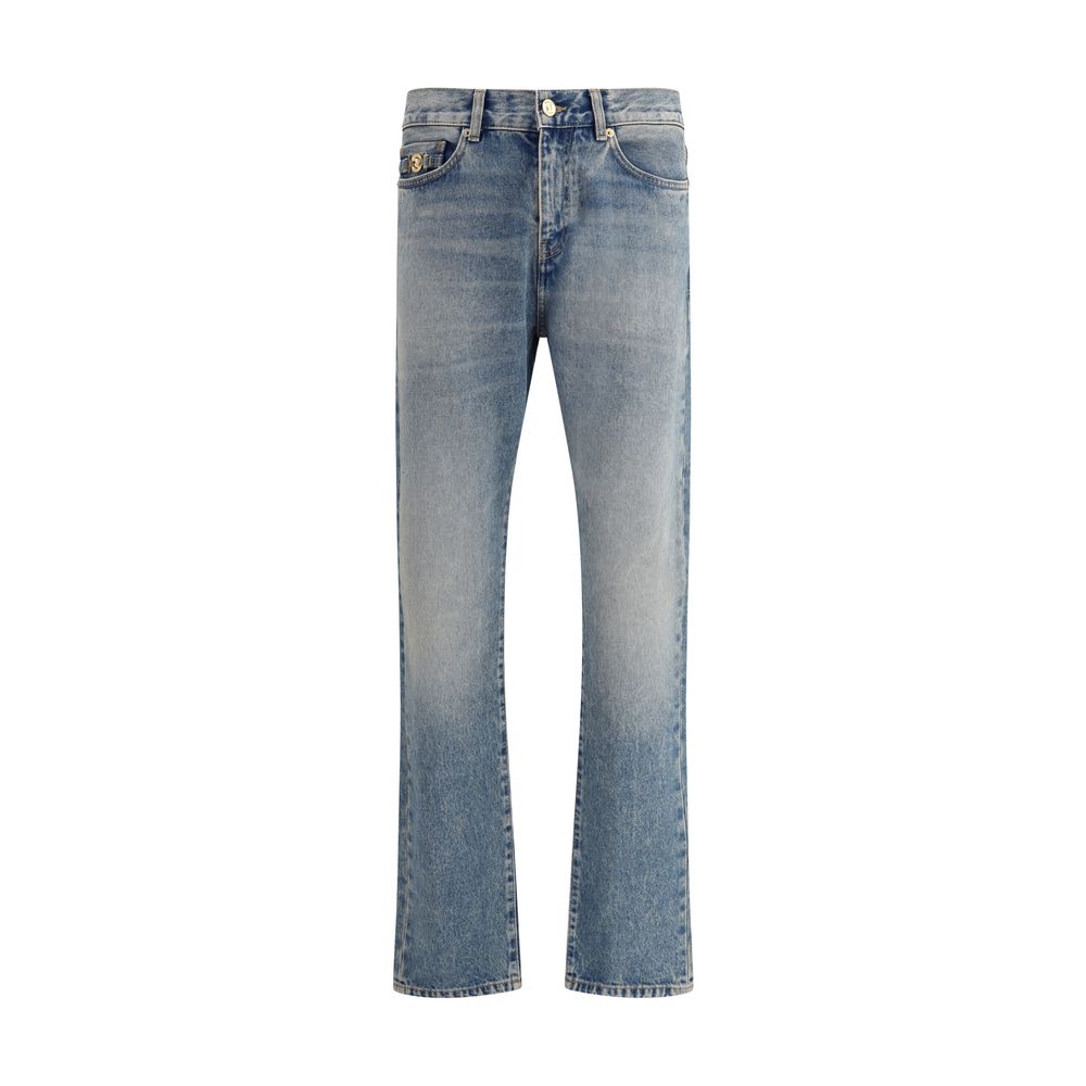 Blue Cotton Straight-Leg JeansVersace’s cotton Jeans combine classic design with the Maison’s iconic codes. They feature a front zipper and button closure, belt loops at the waist and a traditional five-pocket pattern. On the front, a metallic detail with