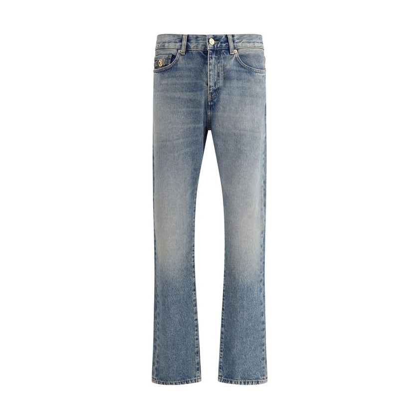 Blue Cotton Straight-Leg JeansVersace’s cotton Jeans combine classic design with the Maison’s iconic codes. They feature a front zipper and button closure, belt loops at the waist and a traditional five-pocket pattern. On the front, a metallic detail with