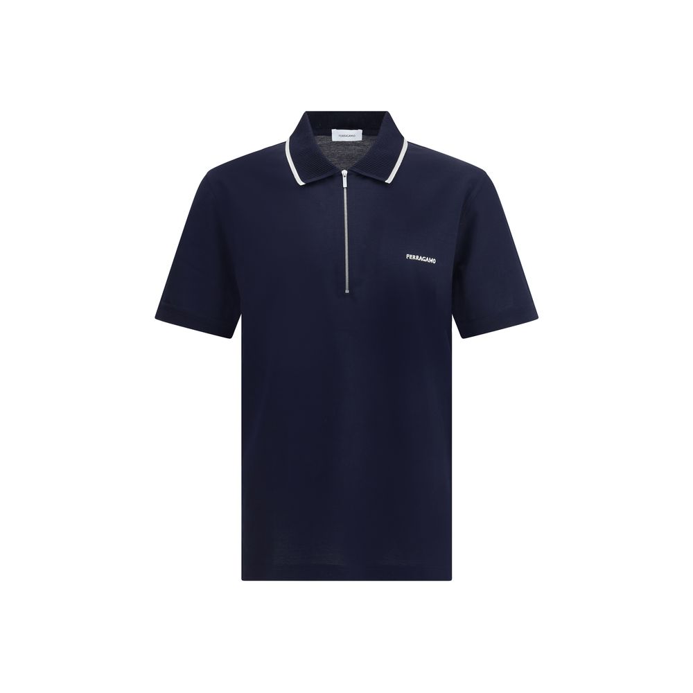 Blue Cotton Polo ShirtCotton polo shirt by Ferragamo has a refined and contemporary design. The classic collar is defined by a contrasting profile, while the zipper front closure adds a modern touch. The iconic Ferragamo monogram, embroidered in contrast