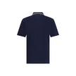 Blue Cotton Polo ShirtCotton polo shirt by Ferragamo has a refined and contemporary design. The classic collar is defined by a contrasting profile, while the zipper front closure adds a modern touch. The iconic Ferragamo monogram, embroidered in contrast