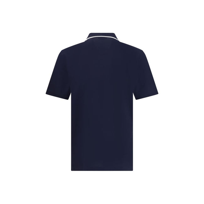 Blue Cotton Polo ShirtCotton polo shirt by Ferragamo has a refined and contemporary design. The classic collar is defined by a contrasting profile, while the zipper front closure adds a modern touch. The iconic Ferragamo monogram, embroidered in contrast