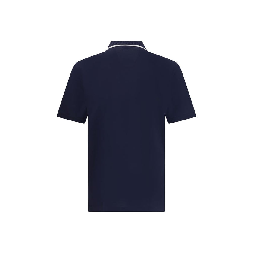 Blue Cotton Polo ShirtCotton polo shirt by Ferragamo has a refined and contemporary design. The classic collar is defined by a contrasting profile, while the zipper front closure adds a modern touch. The iconic Ferragamo monogram, embroidered in contrast