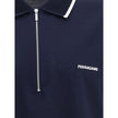 Blue Cotton Polo ShirtCotton polo shirt by Ferragamo has a refined and contemporary design. The classic collar is defined by a contrasting profile, while the zipper front closure adds a modern touch. The iconic Ferragamo monogram, embroidered in contrast