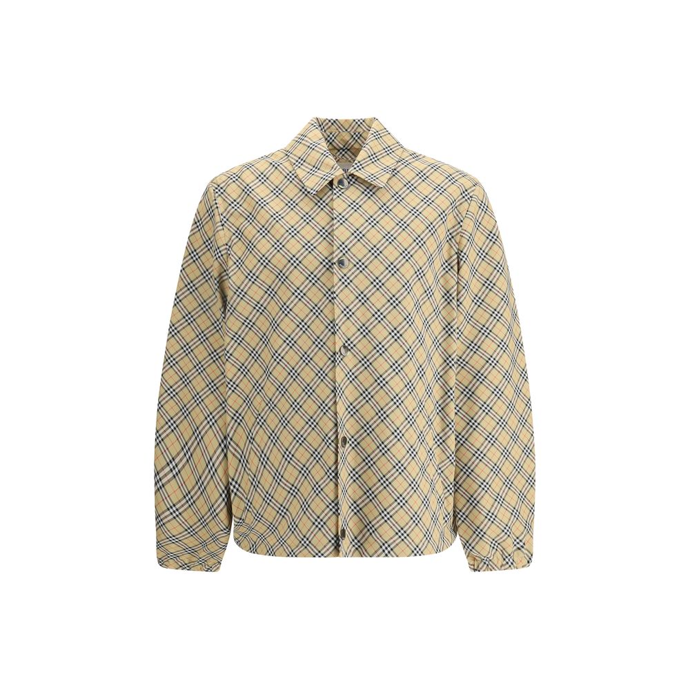 Beige Polyester Jackets And CoatBurberry’s signature shirt-cut jacket is crafted with an essential and contemporary design. The design features a classic collar, front snap button closure and elastic cuffs for a comfortable and functional fit. The adjusta