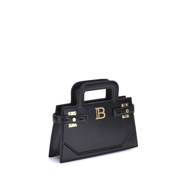 B-buzz Small HandbagBalmain’s B-Buzz small Handbag features two top handles and a removable chain strap, adding to its versatility. The metal 