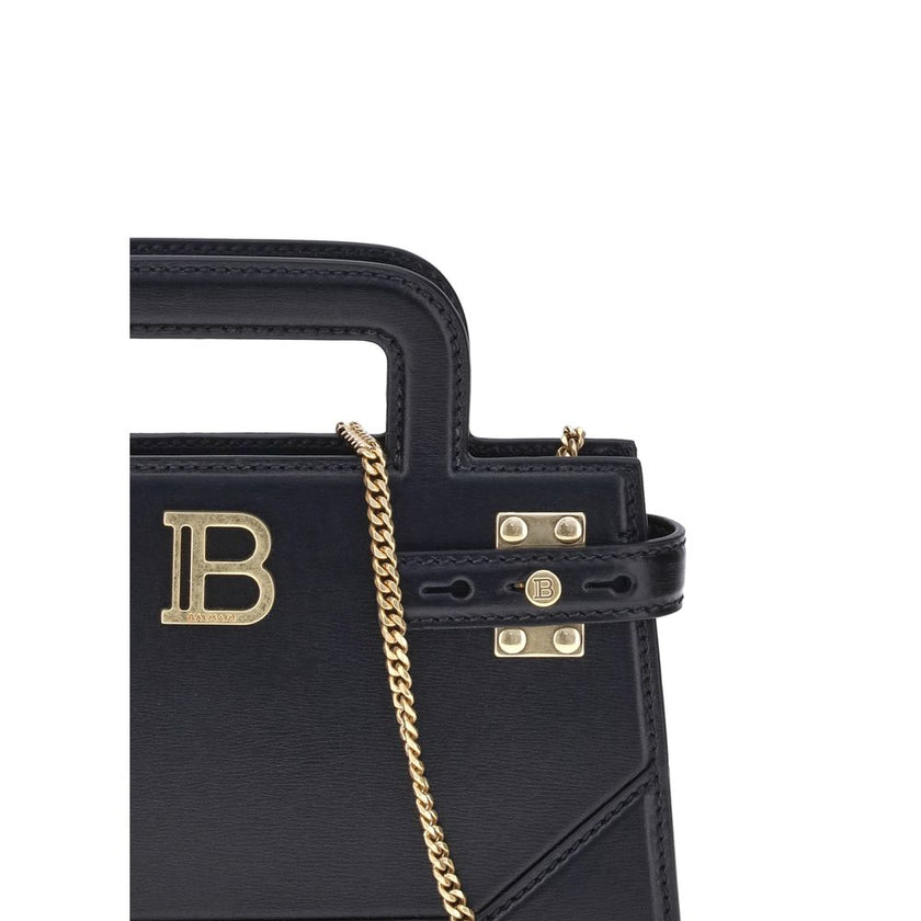 B-buzz Small HandbagBalmain’s B-Buzz small Handbag features two top handles and a removable chain strap, adding to its versatility. The metal 