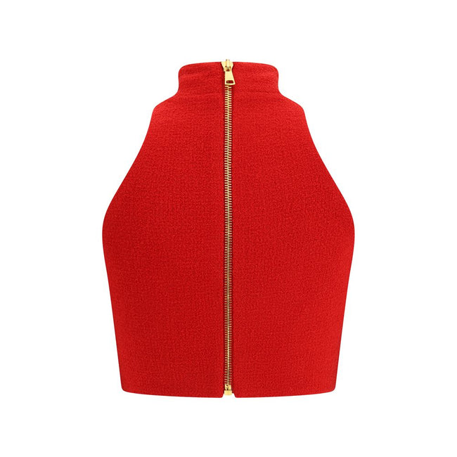 Red Fleece Wool TopBalmain’s bouclé wool crop Top is a sophisticated and characterful piece. Sleeveless and high-necked, it features a front zipper closure that adds a modern and functional detail, making it perfect for sleek, contemporary looks. Season: