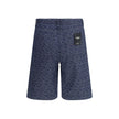 Blue Cotton Bermuda ShortsCotton Shorts by Fendi featuring a denim design embellished with an all-over contrasting FF jacquard pattern. The model features a five-pocket construction, front zipper and button closure, and belt loops at the waist. An iconic