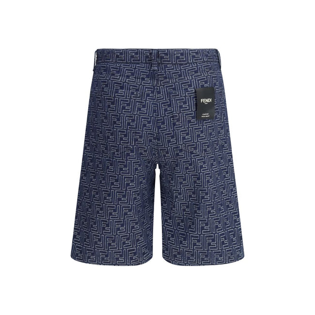 Blue Cotton Bermuda ShortsCotton Shorts by Fendi featuring a denim design embellished with an all-over contrasting FF jacquard pattern. The model features a five-pocket construction, front zipper and button closure, and belt loops at the waist. An iconic