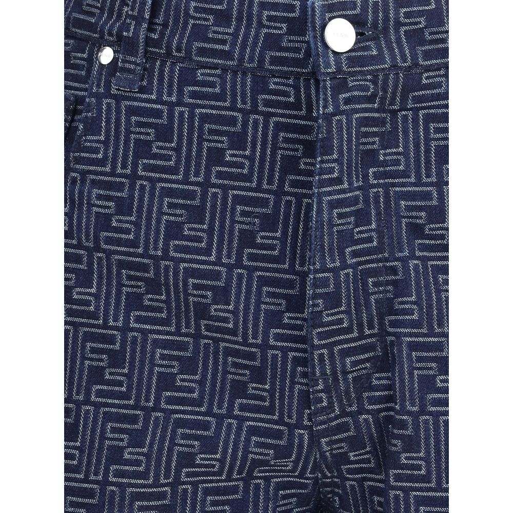 Blue Cotton Bermuda ShortsCotton Shorts by Fendi featuring a denim design embellished with an all-over contrasting FF jacquard pattern. The model features a five-pocket construction, front zipper and button closure, and belt loops at the waist. An iconic