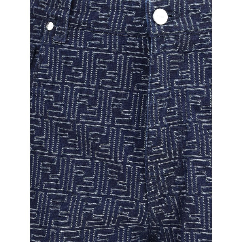 Blue Cotton Bermuda ShortsCotton Shorts by Fendi featuring a denim design embellished with an all-over contrasting FF jacquard pattern. The model features a five-pocket construction, front zipper and button closure, and belt loops at the waist. An iconic