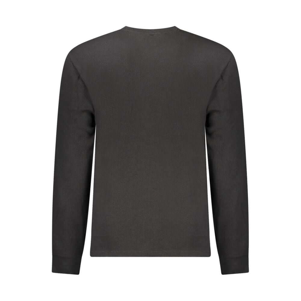Black Cotton Men SweaterElevate your wardrobe with a timeless staple that exudes modern sophistication. This Calvin Klein long-sleeved T-shirt boasts the perfect blend of style and comfort, making it an essential addition to any fashion-forward ensemble.