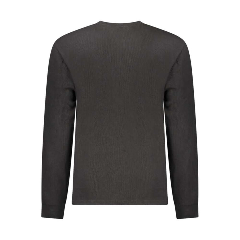 Black Cotton Men SweaterElevate your wardrobe with a timeless staple that exudes modern sophistication. This Calvin Klein long-sleeved T-shirt boasts the perfect blend of style and comfort, making it an essential addition to any fashion-forward ensemble.