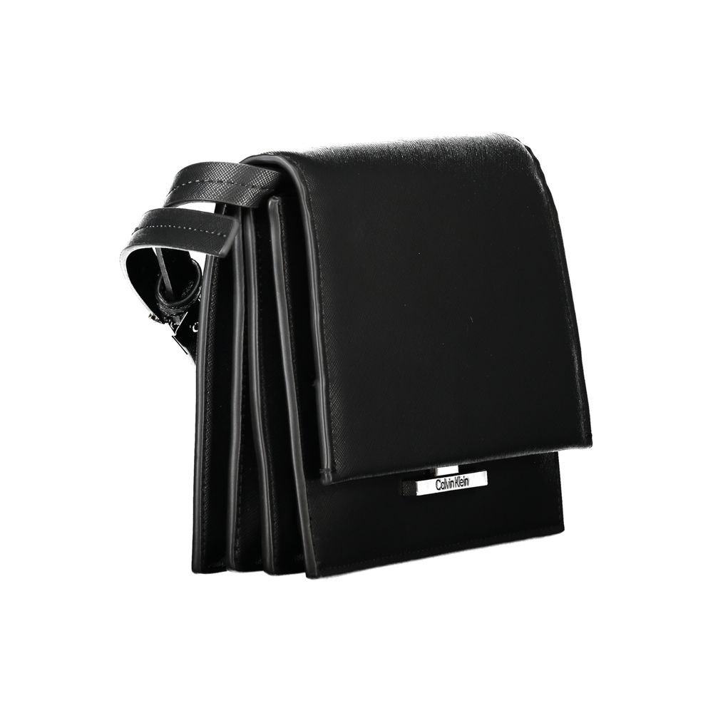 Black Polyethylene HandbagADJUSTABLE AND REMOVABLE SHOULDER BAG, 3 INTERNAL COMPARTMENTS, 1 INTERNAL POCKET, SNAP CLOSURE, LOGOBlack Polyethylene Handbag${tagsCalvin KleinAulae Black Polyethylene Handbag Calvin KleinAulae Black Polyethylene Handbag ADJUST