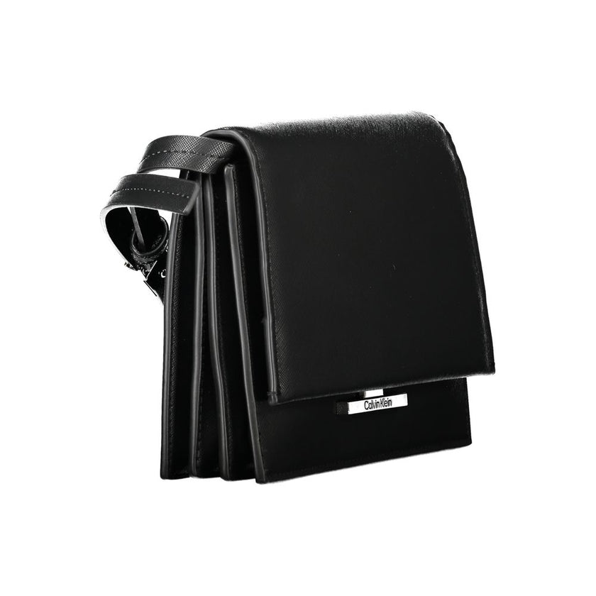 Black Polyethylene HandbagADJUSTABLE AND REMOVABLE SHOULDER BAG, 3 INTERNAL COMPARTMENTS, 1 INTERNAL POCKET, SNAP CLOSURE, LOGOBlack Polyethylene Handbag${tagsCalvin KleinAulae Black Polyethylene Handbag Calvin KleinAulae Black Polyethylene Handbag ADJUST