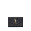 Leather WalletSaint Laurent’s leather Wallet combines functionality and style in a compact and elegant design. Featuring a snap-button closure, it features a logo plaque on the front that adds an iconic touch. There is a handy slit pocket on the back, whi