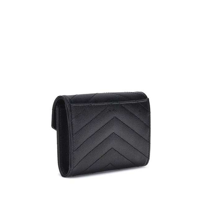 Leather WalletSaint Laurent’s leather Wallet combines functionality and style in a compact and elegant design. Featuring a snap-button closure, it features a logo plaque on the front that adds an iconic touch. There is a handy slit pocket on the back, whi