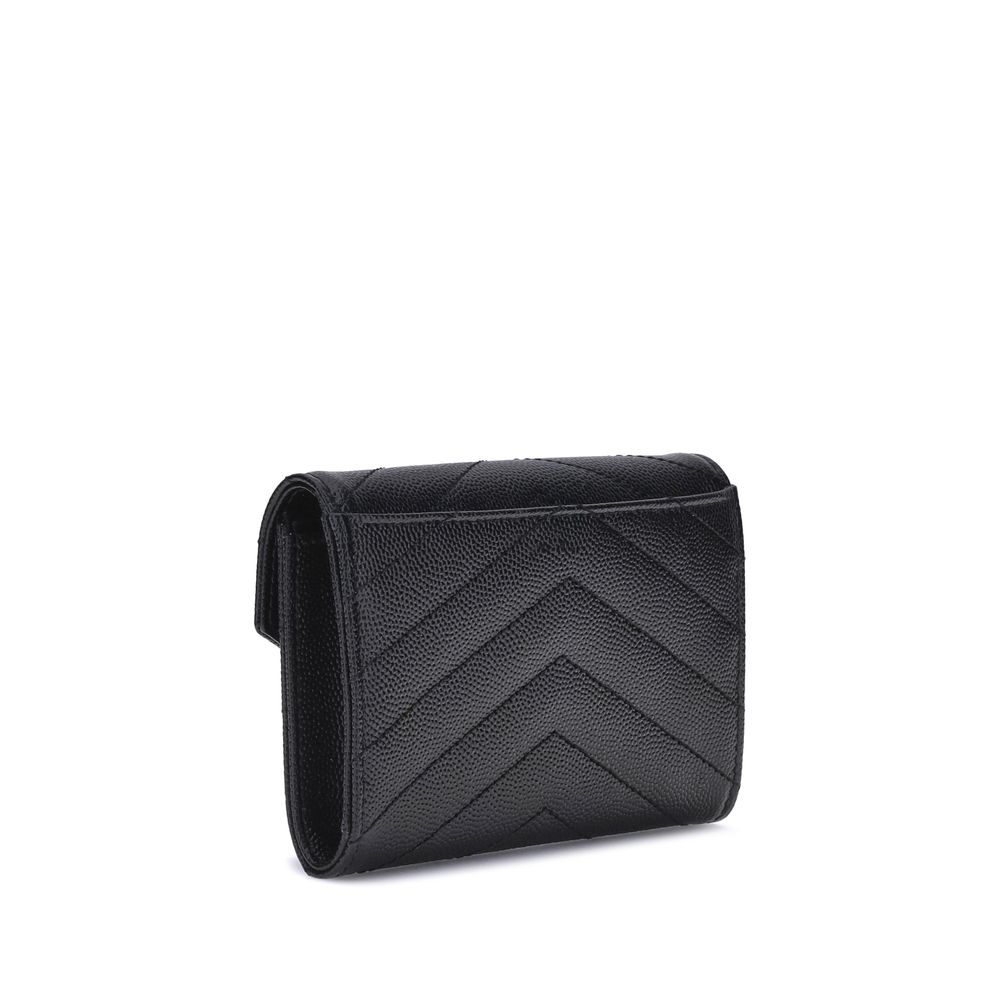 Leather WalletSaint Laurent’s leather Wallet combines functionality and style in a compact and elegant design. Featuring a snap-button closure, it features a logo plaque on the front that adds an iconic touch. There is a handy slit pocket on the back, whi