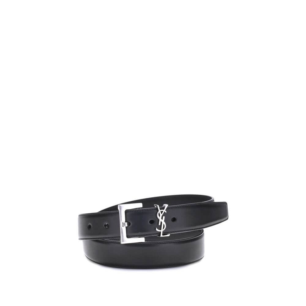 Black Calf Leather Bos Taurus Regular BeltThe leather Belt by Saint Laurent combines minimalist elegance with iconic details. It is embellished with a silver-colored geometric buckle and a three-dimensional YSL logo plaque, a symbol of refinement and time