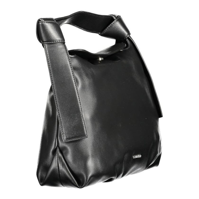 Black Polyester Handbagbag 1 handle, adjustable and removable shoulder strap, 1 inside pocket, contrasting details, snap closure, logo, 100% recycled polyesterBlack Polyester Handbag${tagsCalvin KleinAulae Black Polyester Handbag Calvin KleinAulae Black P